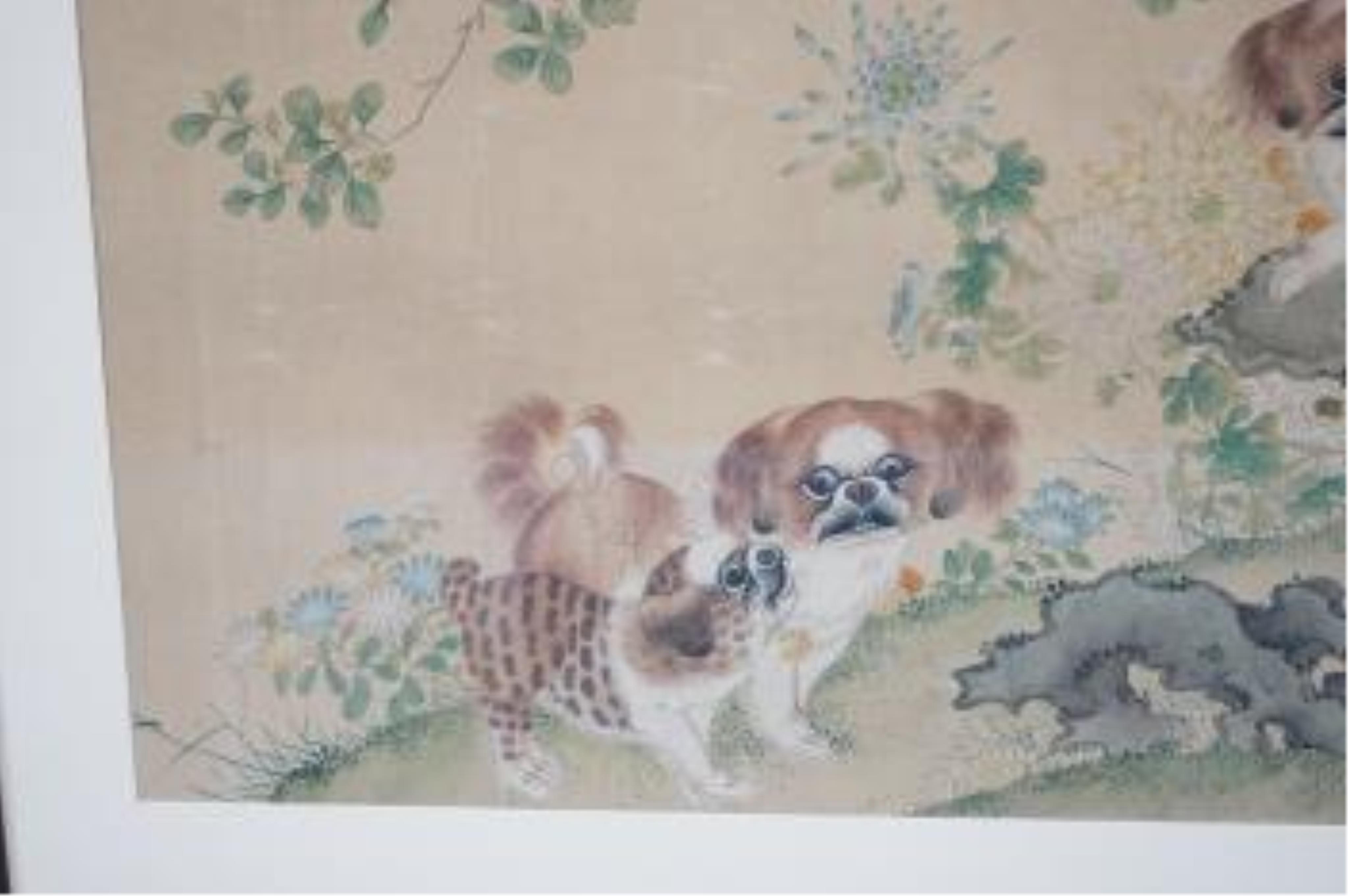 Late 19th/early 20th century, Chinese school, ink and colour on paper, Chi dogs in a rockwork garden, unsigned, 59 x 105cm. Condition - poor